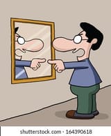man-talks-himself-on-mirror-260nw-164390618