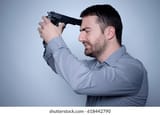 frantic-man-shooting-himself-gun-260nw-618442790