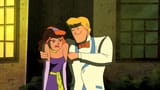 evil Fred pierces Daphne&#039;s shoulder with his metal finger