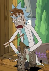 rick covered in shit with an arrow through his chest and a bear trap on his leg