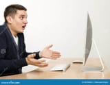 angry-man-yelling-computer-screen-young-expresses-anger-fury-sitting-front-large-smart-casual-dress-beige-office-desk-60734066