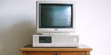 pngtree-a-vintage-computer-monitor-sitting-on-top-of-an-old-desktop-image_17247239