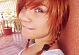 redhead biting her lip
