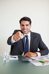 portrait-angry-businessman-pointing-viewer_13339-197146