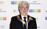 George attended Barack Obama&#039;s inauguration party, campaigned for Hillary, and donated to BLM