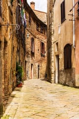 depositphotos_106086730-stock-photo-street-of-the-medieval-village