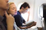 woman-sleeping-on-flight