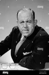 1950s-1960s-portrait-of-man-businessman-worried-unhappy-frowning-leaning-CMRRT5