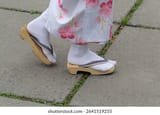 girl-traditional-japanese-wooden-sandals-260nw-2641519255