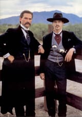 Val-Kilmer-as-Doc-Holliday-left-with-Kurt-Russel-as-Wyatt-Earp-right-719x1024