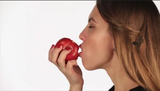 beautiful-girl-eating-apple-footage-072224967_iconl