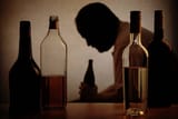 alcohol-bottles-with-the-silhouette-of-an-alcoholic-man