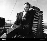 marlon-brando-actor-on-seat-october1954-B4HJJG