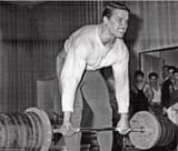 arnold-schwarzenegger-deadlifting-with-barbell