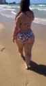 woman enjoys beach and hotel_thumb.jpg
