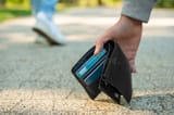 man-picking-lost-wallet-ground-outdoors-closeup-space-text-man-picking-lost-wallet-ground-outdoors-closeup-space-262085057