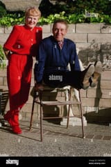 physical-fitness-buff-jack-lalanne-demonstrates-at-age-75-he-still-has-the-strength-and-body-of-someone-20-years-his-junior-as-his-wife-elaine-looks-on-at-their-home-in-morro-bay-calif-sept-20-1990-undaunted-by-inc