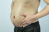 men-with-pot-bellies-or-belly-fat-close-up-of-body-parts-photo