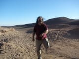 richard stallman in atacama standing on one foot