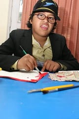 india-a-special-kid-mentally-retarded-painting-at-the-kala-manjari-workshop-organized-by-four copy 2
