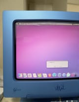 A photo of a Bondi Blue iMac G3