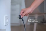 man-about-to-plug-in
