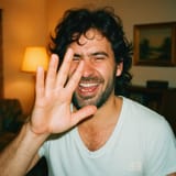 20250712_1617_1980s Laughing Man_simple_compose_01k004j6ddf22b1x45yqyzgmsy