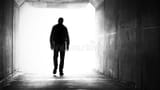 silhouette-man-walking-out-dark-tunnel-towards-light-shoulders-slumped-bright-death-dying-leaving-loss-concept-204538513-3777131209