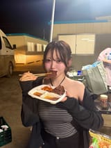 LargeBreastedAsianWomanEating