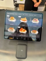 250721-tesla-diner-menu-screen-ac-826p-f4eaf8