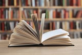 book-open-pages-close-up-600nw-2562942291