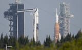 NASA’s_SLS_and_SpaceX’s_Falcon_9_at_Launch_Complex_39A_&amp;_39B_(NHQ202204060003)