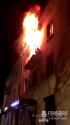 Retarded Russian man would rather sit down and burn to death on balcony, rather than jump down and probably survive_thumb.jpg