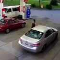 Nigger at a gas station gets blasted by a based Sheboon with a pistol_thumb.jpg