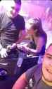 Slut sucking dudes dick in a club_thumb.jpg