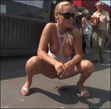 pissing street woman kick old man