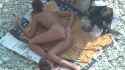 Girl with plug in the ass poses for a guy at a public beach 02_thumb.jpg