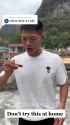 Guy eats giant hornet_thumb.jpg