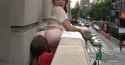 Brunette Eats Redhead&#039;s Ass on the balcony in some city_thumb.jpg