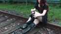 Alice Walking Down The Railway In Boots_thumb.jpg