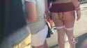 Brunette wearing short skirt and thong spreads her large butt cheeks - Candid Creepshot 1702214091716037_thumb.jpg