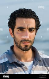 portrait-of-a-young-middle-eastern-male-by-the-sea-beirut-lebanon-B9CBT7
