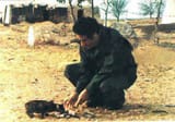 Gaddafi with a cat