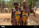 turmi-ethiopia-january-25-2018-unidentified-hamer-tribe-woman-hamer-woman-usually-comb-their-hairs-with-soil-in-turmi-omo-valley-ethiopia-MB1RHX[1]