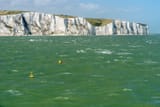 uk--dover--view-from-stormy-english-channel-to-chalk-cliffs-620929053-5c28de1446e0fb0001ca5f51