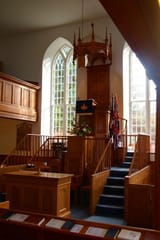 The pulpit and communion table from the Church of Scotland church in Duirinish, Skye. Between the two is the box for the precentor.