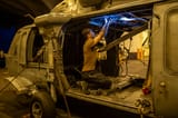 aviation_electrician_s_mate_3rd_class_caleb_presnal_performs_maintenance_on_an_mh_60r_sea_hawk_on_uss_carl_vinson