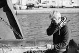 fisherman_mending_his_nets