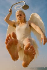 20250617_1503_Angel Shower Cascade_remix_01jxzm87dme31a0xf8gtg3370s