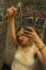20250624_2307_Chaotic Punk Bathroom Selfie_remix_01jyjgpxj1eky8svbqbg5gm15p